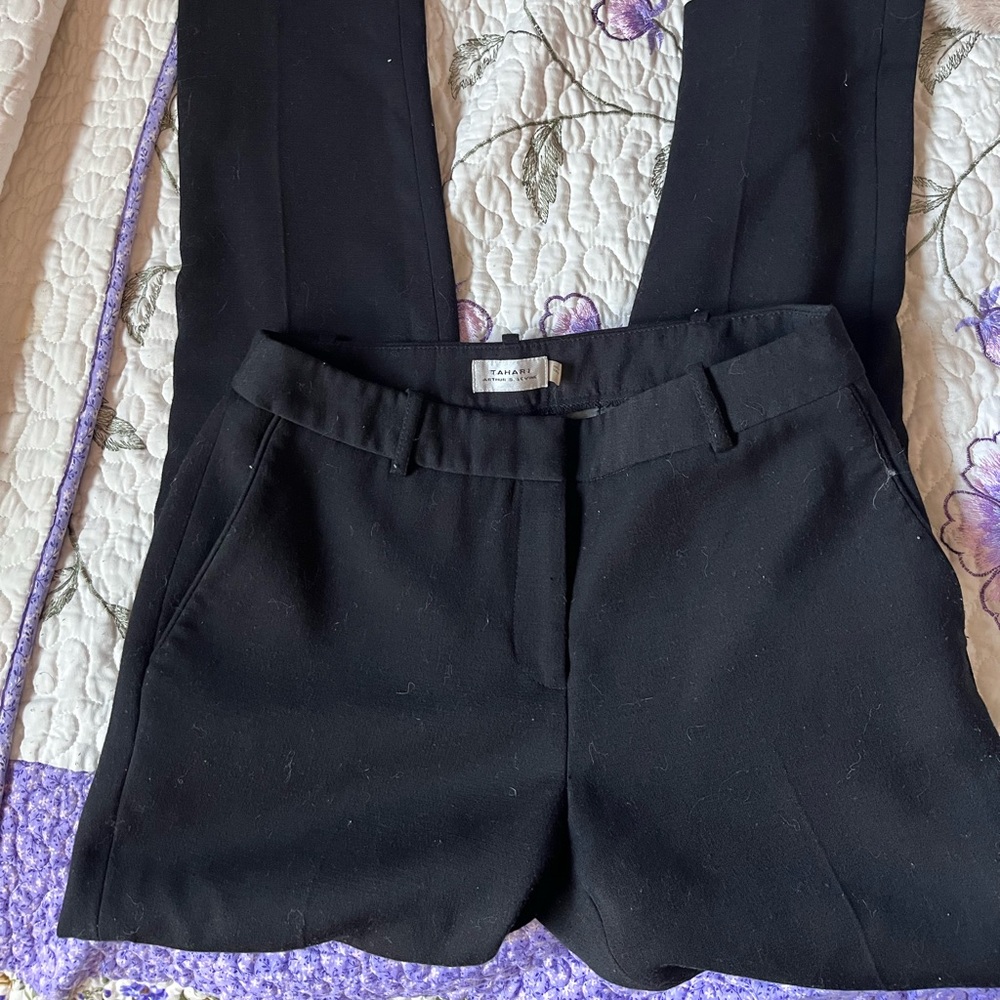 Black tailored trousers with a nice fit and a good amount of stretch.